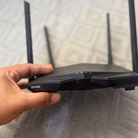 تندا ١٢٠٠ • راوتر • واي فاي