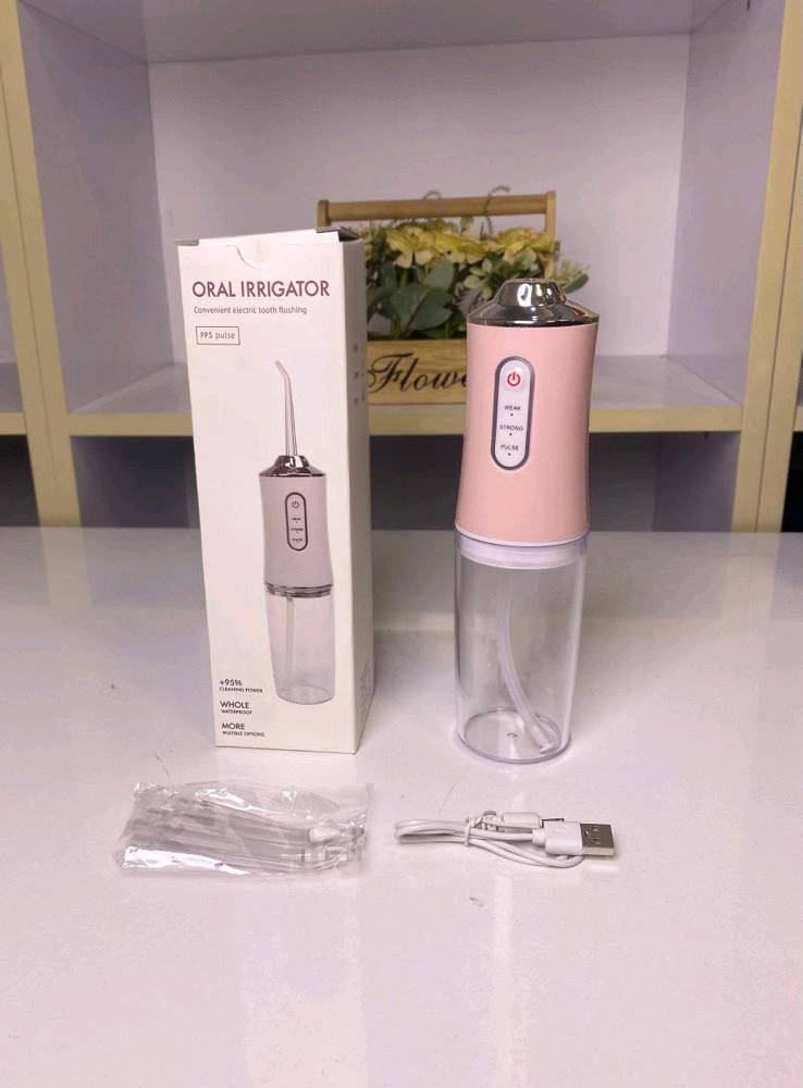 الاسم: جهاز تنظيف الاسنان 
الوصف: جهاز تنظيف الأسنان المائي (Oral Irrigator)، يعمل بنظام ضخ الماء بالنبضات لتنظيف ما بين الأسنان واللثة بفعالية أكبر من الفرشاة والخيط التقليدي. يحتوي على خزان ماء بسعة 220 مل و 3 مستويات للضغط (ضعيف - قوي - نبضي)، مع رؤوس متعددة للاستعمالات المختلفة يمكن تدويرها 360° للوصول لأدق الأماكن. يعمل بالشحن ومناسب للاستخدام المنزلي أو أثناء السفر.


---

النص الإعلاني:

🦷💦 احصل على نظافة أسنان احترافية… كأنك طالع من عيادة طبيب الأسنان!

جهاز التنظيف المائي يزيل بقايا الطعام والبلاك من بين الأسنان واللثة بطريقة آمنة ولطيفة:

✔ خزان ماء 220 مل يكفي لجلسة كاملة
✔ 3 أوضاع تنظيف (ضعيف – قوي – نبضي)
✔ رؤوس متعددة وتدور 360° للوصول لكل الزوايا
✔ يعمل بالشحن وسهل الحمل للسفر

ودّع الخيط المزعج وفرش الأسنان التقليدية!
نظافة عميقة، نفس منعش، ولثة صحية كل يوم. ✅