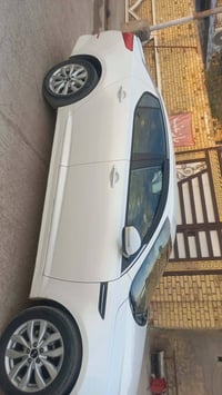 اوبتيما ٢٠١٤ • مكينة ٢٠٠٠ • رقم واسط