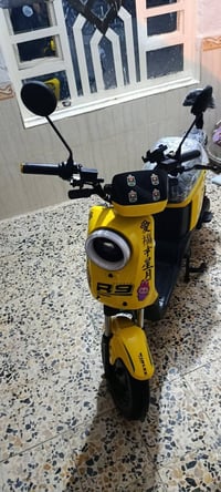 بصره قرمه علي • دراجه شحن • ار 9