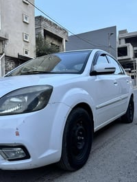 كيا ريو موديل 2011 سنوية لل29  السيارة رقمها دهوك محرك ١٦٠٠  بيها قطعت...