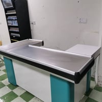 ميز كاشير ١٠٠ الف مامتواد خاص 07700436110