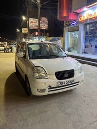 كية بيكانتو 2007 محرك وكير شرط كير عادي قطعتين تبيدل نفس اللون جاملخات...