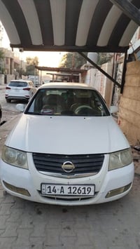 نيسان سني ياباني وارد كوري 2009 كير ومكينه مكفولات بس اكو طكه خفيفه بل...