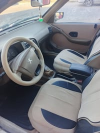 بيجو 405 • ٢٠١٠ • سنوية ل٢٠٣٠