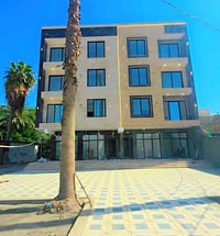 عمارة تجارية • الاسكان شارع 23 • ٧ شقق ٢ محلات