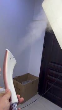 مكواة بخارية محمولة • ٢٠٠٠ واط • تعقيم بالبخار