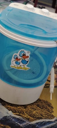 غسالة • النجف