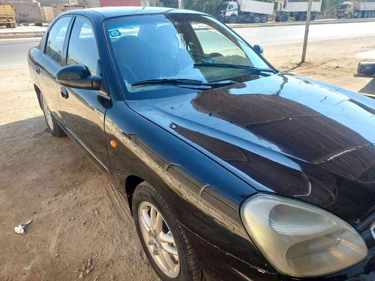 سلام عليكم دايو نوبرا موديل ٢٠٠٠ بغداد دولي شرط تحويل سياره كفاله من حادث وتبديل  فقط صبغ حزام جماليه محرك كير جدد صدر امامي خلفي جديد تخم تاير جديد تبريد شغال ترايك شرط وين ميعجبك للتواصل *********** مكان سياره محافظة الديوانيه
