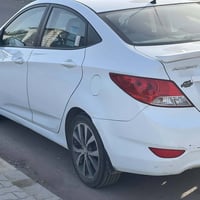 اكسنت ٢٠١٥ • رقم نجف • شاشة وكاميرا