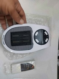 جهاز تدفئة مكتبي ريموت كنترول تحكم بالوقت والحرارة جديد غير مستخدم.......