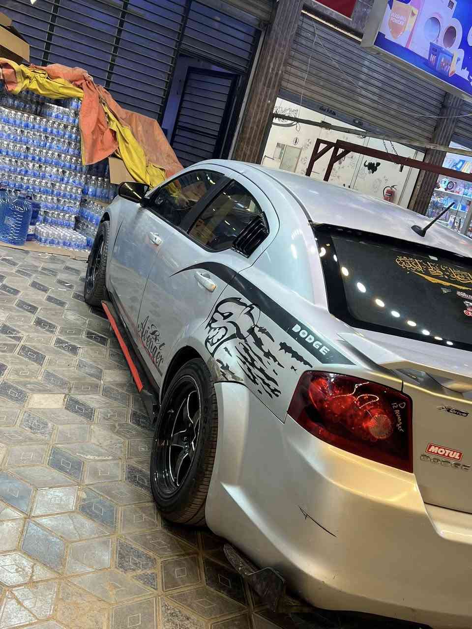 من رخصة الادمن السلام عليكم دوج افنجر موديل 2009 السياره تخم تاير مكفوله شواصي ولغود ابيعلك احزام بيها مكانات رشش فقط  تبريد شغال فقط منقص غاز من بدلت المحرك كير ومحرك وصدر وضهر كله جديد مناقصها شي ابد بغداد بسمي تحويل مباشر  مكان السياره بغداد السعر 70 وبيها مجال حادث امريكا جاملغ وباب وبل عراق باب  للاستفسار ***********
