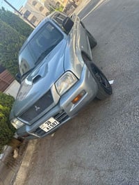 متسوبيشي L200 • L200 • متسوبيشي 2003 • فور ويل • دبل كابين • سيارة بيك...