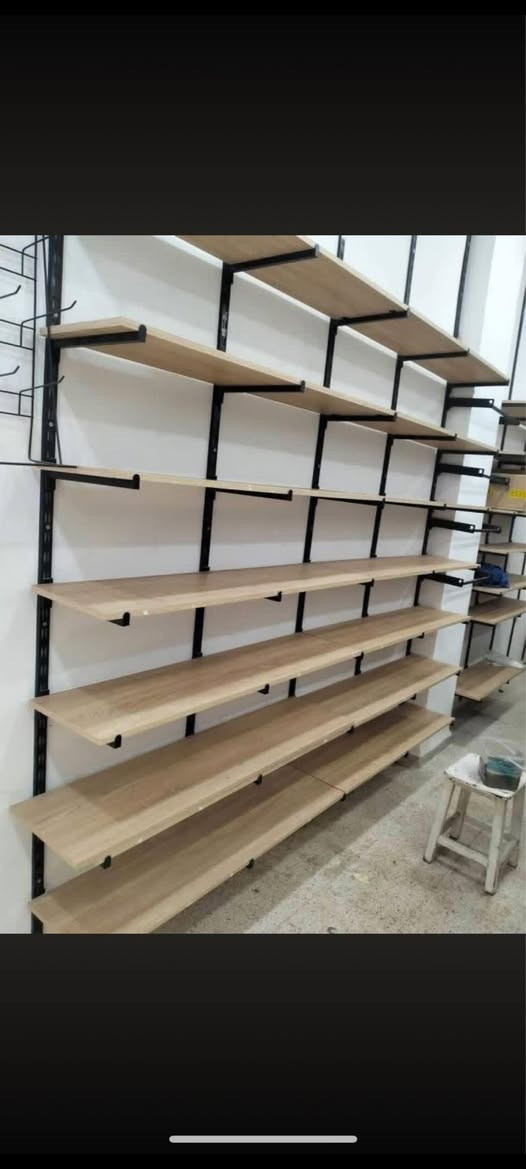 سلام عليكم رفوف خشب mdf العدد ١٣ رف قياس الرف مترين واربعين مع سجج والحمالات مكاني بغداد الإسكان السعر عل خاص او اتصل ***********
