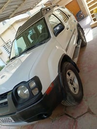 نيسان اكس تيرا موديل 2004 سيارة جاهزة من كل شي  مكينه كير تبريد كله تم...