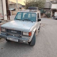 ازوزه • ١٩٩٠ • قير ومحرك بطه