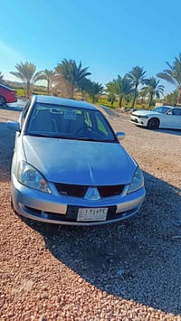 لانسر ٢٠١٠ • رقم قادسيه • تواير جديد