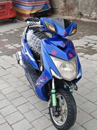 سكوتر • مكينة ٥٩ • كفالة