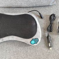 مدلكة ظهر ورقبة • كهربائية • تشتغل بالسيارة