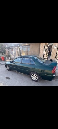 اخوان سياره متسوبيشي لانسر موديل 99 للبيع كير محرك مكفولات كير اوتو تد...