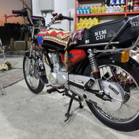 دراجة نارية • موديل ٢٤ • أوراق سكنر