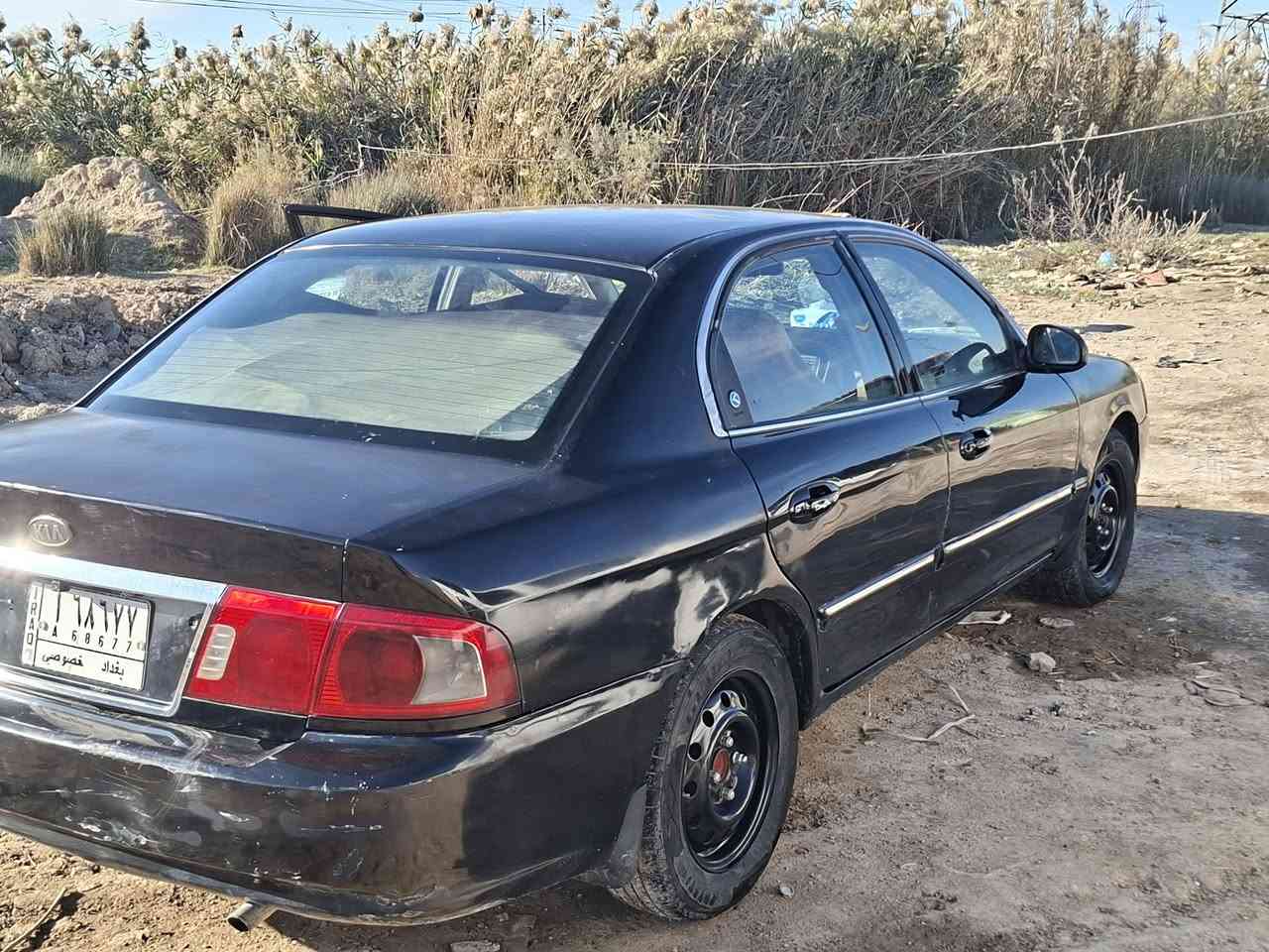كيا اوبتيما موديل 2005 للبيع باسمي رقم بغداد موارد امريكي مكينه 2000 رقم الهاتف *********** مكان السياره ذي قار قضاء الشطره سعر  52 بها مجال
