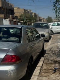 لانسر نسيبوشي 2009  مكينه 1600المرغوب  كير اوتو  تخم داير جديد  صدر ام...