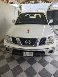 نيسان نيفارا 2014 سعودي رقم بغداد مميز   كير اوتوماتيك +جام كهرباء  شا...