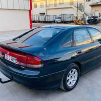 مازدا فاميليا • ١٩٩٥ • كالار