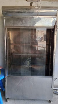 شوايه دجاج للبيع الحجم الكبير جاهزة وشغاله استخدام قليل 07807489753