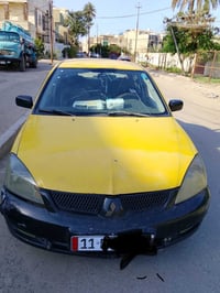 لانسر • ٢٠١٠ • للبيع