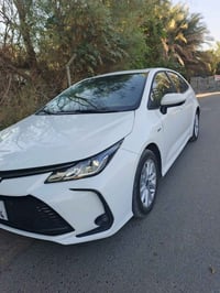 كورلا هايبرد 2025 ماشيه 10الف مكفولة عام  فول مواصفات  فتحة سقف كشنات ...