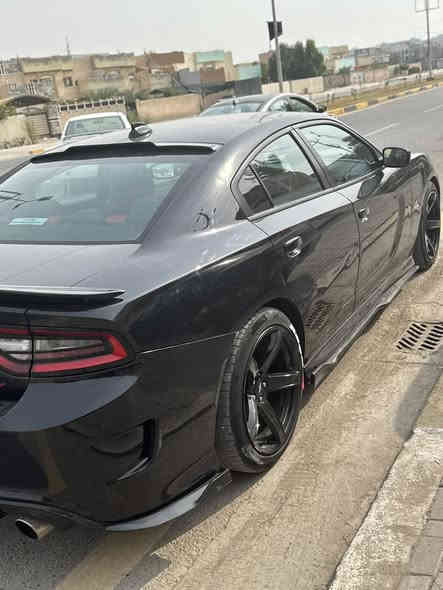 جارجر 2017 RT 5700 للبيع فول مواصفات عدا الفتحة حادثها موضح بالمنشور جداً بسيط وصار بيها هنا هم صبغ يعني 5 قطع فقط بدون ايرباك بس مال برده طاك وراجع الباقي كله سليم 
السيارة بدون لغد وبدون شاصي وكلش نظيفة وحلوة وعليها هواي اضافات لحاية دفيوزر srt بنيد مبدل srt لد داخل المازده متغير الالوان على التلفون يشتغل  ولد داخل السيارة اكثر من 40 لون السيارة عليها برمجة يم غيث طلقات وفصلة وفتح رون وسيفتي كاملة للسيارة 
كلشي مناقصها وسعرها مناسب لان مابيها دواخل ولا ايرباك 
ملاحظة السيارة صوتها بلادي وكلش حلو وقوي 
مكان السيارة بغداد حي الجهاد
***********
السعر 167 وبيها مجال شي كلش كلش بسيط حك الجية
