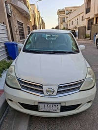 وبركاته نيسان تيدا موديل 2009 السعر / ٧٢    وبيها مجال رقم الهاتف /077...