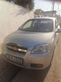 سيارة افيو موديل 2009  داخل اصفر گير أوتو سنوية جديدة الحد 2028 وبيها ...