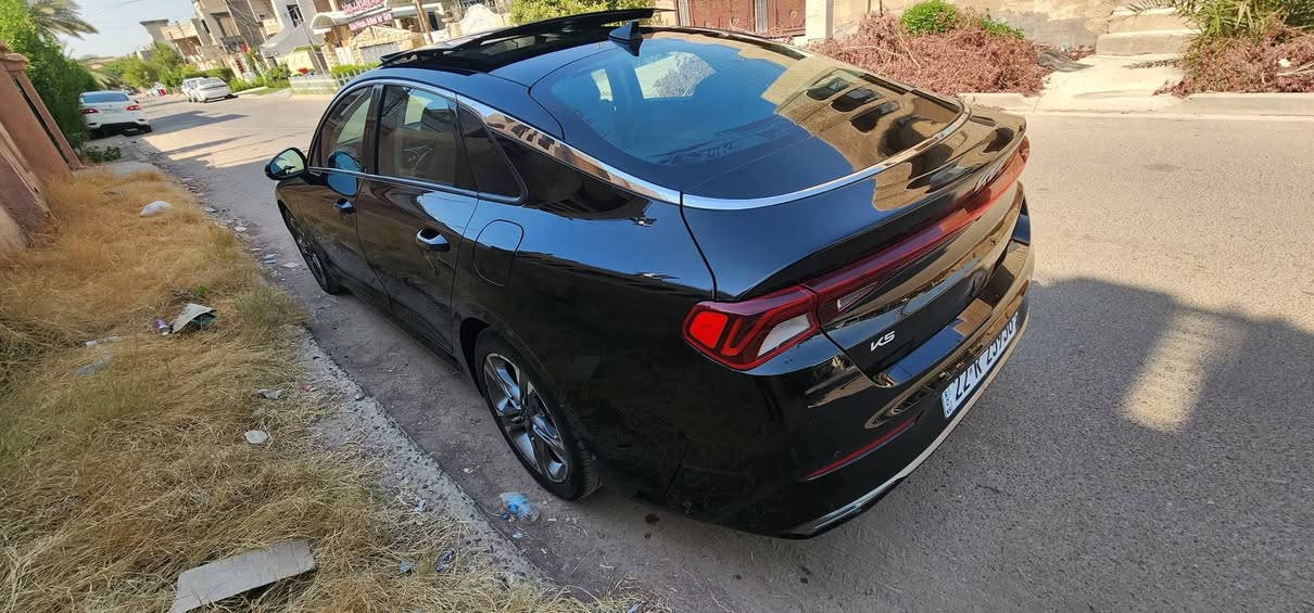 2024  KIA K5, EX 
•الرقم: اربيل تحويل للمشتري مباشر
 فقط اربع أصابع تكحيل بالبنيد  بدون اي ضرر داخلي شاصي لغد كفالة بدون رصعات بدون شخوط جدا نظيفه 
•المواصفات :
▪️السيارة: #كيا K5 EX اسود 
▪️الموديل: 2024
▪️حجم الويل: ويل كب حجم 19 
▪️لايتات زينون اربع عدسات مع حاجب LED مع اشارة LED
▪️بصمات عدد 2 للأبواب مع بصمة تشغيل وتشغيل عن بعد
▪️قمارة بانوراما
▪️نظام 5 كامرات
▪️رادار امامي مانع تصادم
▪️حساس امامي
▪️حساس خلفي
▪️رادار جانبي (نقاط عمياء) بالمرايا الجانبية
▪️شاحن لاسلكي
▪️اشاير بالمرايا الجانبية
▪️مرايا شفط
▪️مرايا قلاب
▪️كامرة خلفية دوارة اصل مع الستيرن
▪️شاشة الدشبول حجم كبير للتحكم بأيعازات السيارة
▪️كشنات السيارة جلد lبيض
▪️گشن ذاكرة (خزن ميموري) لكرسي السائق
▪️تحكم فول كهرباء لكرسي السائق والراكب
▪️تدفئة وتبريد للگشنات الأمامية
▪️تبريد قطعتين امامي وخلفي
▪️خمسة وضعيات للقيادة
▪️تشغيل عن بعد
▪️سستم صوت BOSE بواقع 12 سماعة في المركبة
▪️سايد بريك دگمة
▪️تحكم ستيرن جهتين بلوتوث وحاكية وكروس سرعة وتحكم صوت 
▪️نظام ABS مانع انزلاق
▪️السيارة فئة EX فول اعلى فئه 
السعر مناسب 190 وبيه مجال
مكانه بغداد المنصور 
للاتصال على الرقم ***********
