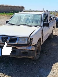 للبيع سياره نيسان 2002 خمسه جنگال  گير وشاصي شرط  محرك گايم  رقم بغداد...