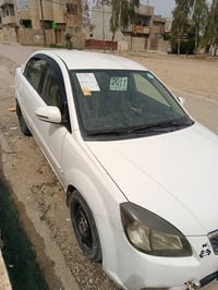 كيا ريو 2011 قطعتين بدون دواخل  رقم اربيل تحويل فقط  كير محرك شرط  الس...