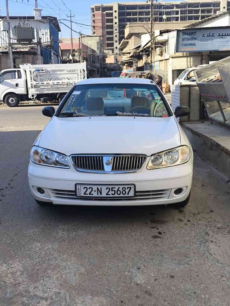سياره نيسان سني موديل 2004محرك نضيف ومكينه خير من الله كير أو تماتيك تغير الون من اصفر الى ابيض خصوصي رقم اله***********

