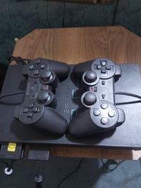 بلايستيشن ٢ اصلي • ٨ ألعاب • ٢ يدات