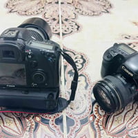 كامرتين كانون D7 مارك 2 الاولى تحتوي رام وكرب وبطاريتين وشاحنه وعدسة ر...
