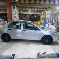 لانسر ٢٠٠٩ • اوتوماتيك • رقم اربيل