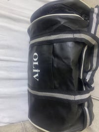 جنطة جلد • سودة • توصيل