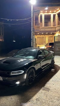 جارجر RT • ٢٠٢٣ • اسود