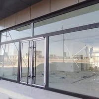 زجاج سكيورتي ١٠ ملم • أبواب هايدروليك • كيرتن وول