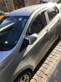 عندي سياره اكراند 2015  مكفوله من الحادث  ماعده بعض الشخوط رقم بغداد ب...