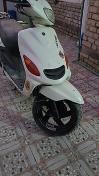 اكزز • ابيض • موتور