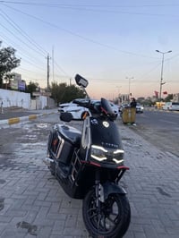 دراجه للبيع تيسلا لون اسود دارجه جديده وحلوه وبطاريات بل كارتون ماشيه ...