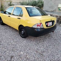 رقم الهاتف 07715378174 السلام عليكم هاي سيارة لانسر موديل 2010 وحلوة و...