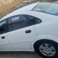 أوبترا موديل 4 كير توماتيك رقم نينوئ بأسمي  نضيفه  للاستفسار اكثر الات...